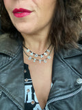 That B necklace