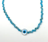 Evil eye mother of pearl round shape and blue gemstone necklace