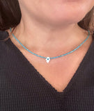 Evil eye mother of pearl hamsa shape and blue gemstone necklace