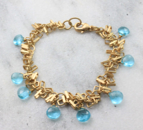 Dangly bracelet with light blue briolettes