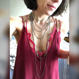 Silver antiqued sequin chain. Layered necklaces
