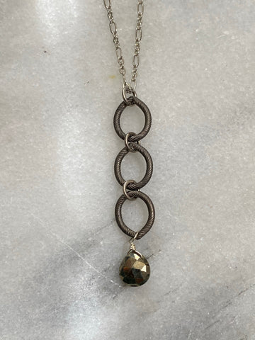 necklace matte gunmetal on triple link. Pyrite