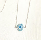 Small round mother of pearl evil eye talisman silver