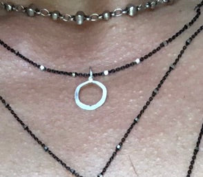 Small silver circle pendant
